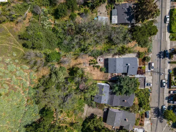 an aerial view of residential house with outdoor space