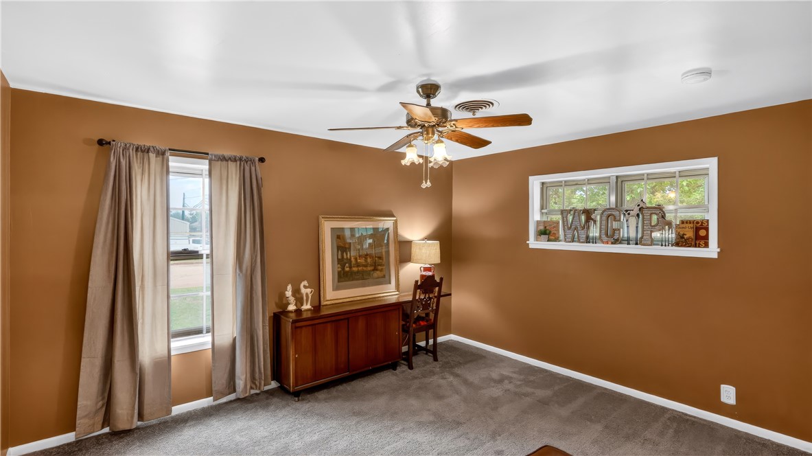 405 North Main Street Franklin, TX 77856 - Photo 21 of 28 a view of workspace with window and ceiling fan