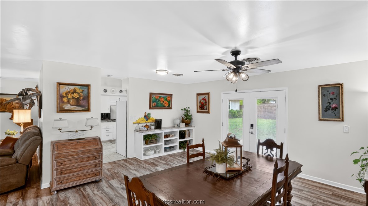 405 North Main Street Franklin, TX 77856 - Photo 9 of 28 a living room with furniture and a wooden floor