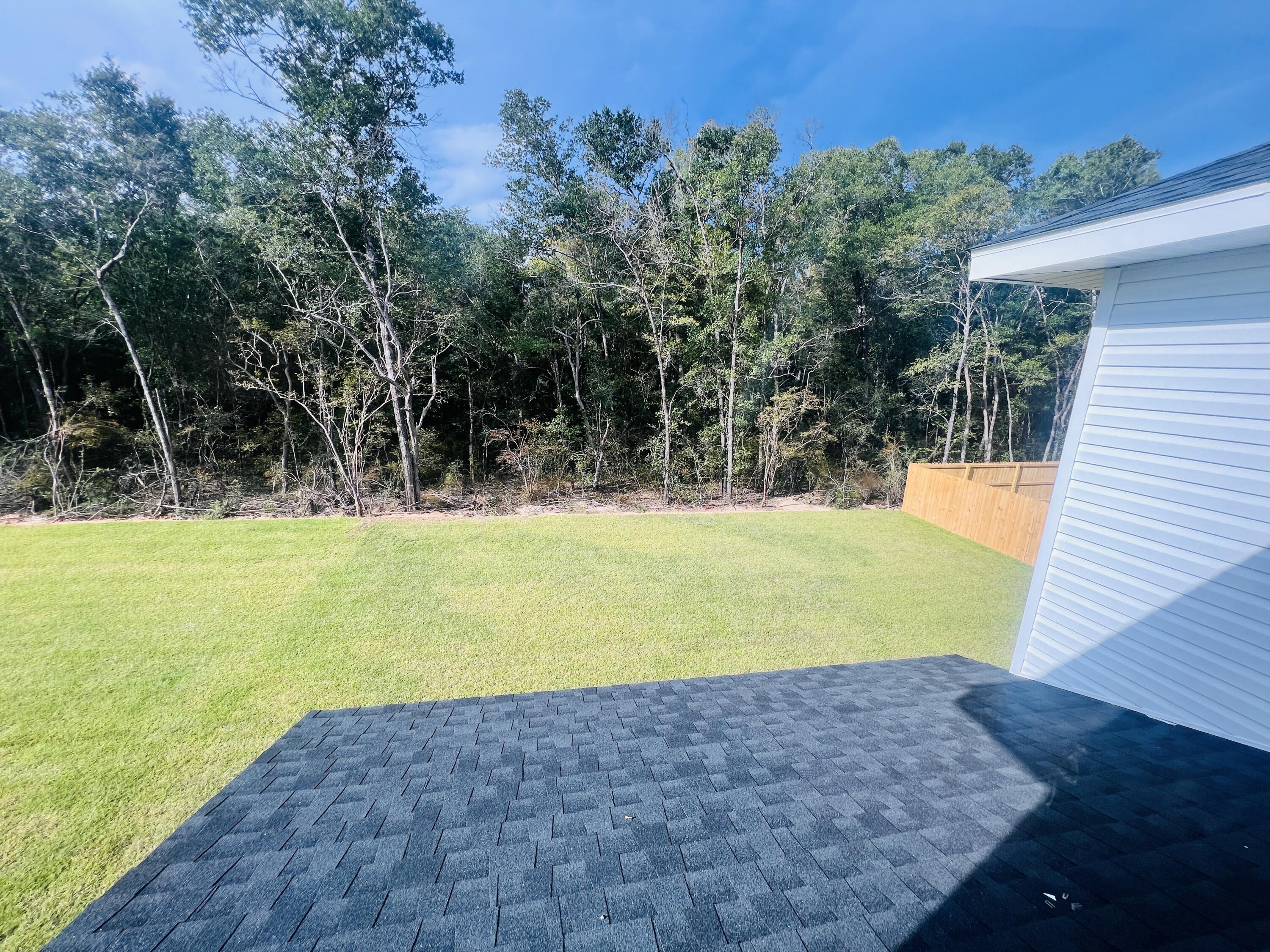 5291 Hidden Pines Circle Milton, FL 32583 - Photo 21 of 21 a view of outdoor space yard and swimming pool