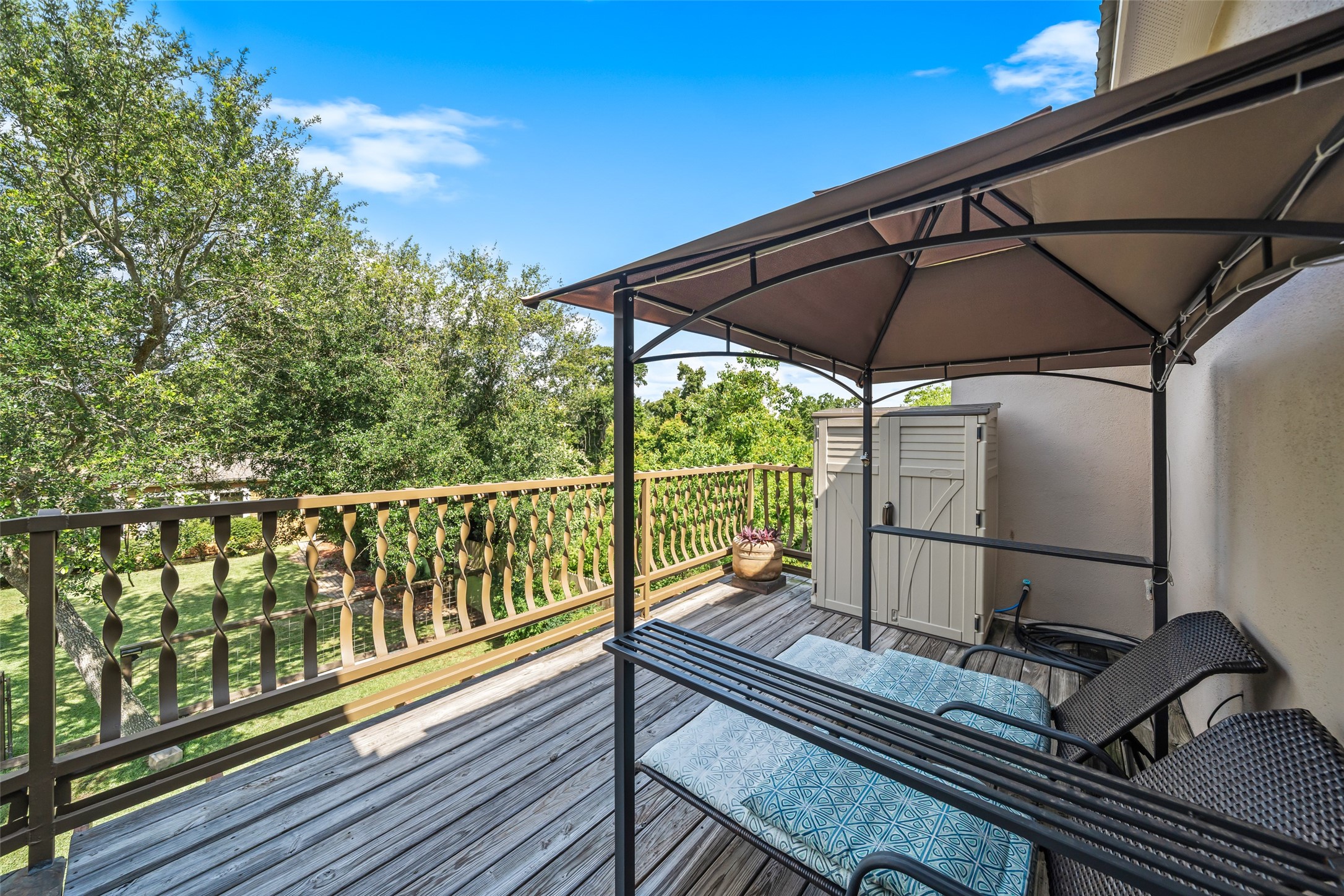 614 Pine Gully Road Seabrook, TX 77586 - Photo 12 of 49 a view of balcony with wooden floor