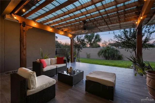 a outdoor living space with furniture and a garden