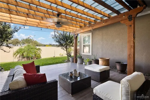 a outdoor living space with furniture and a potted plant