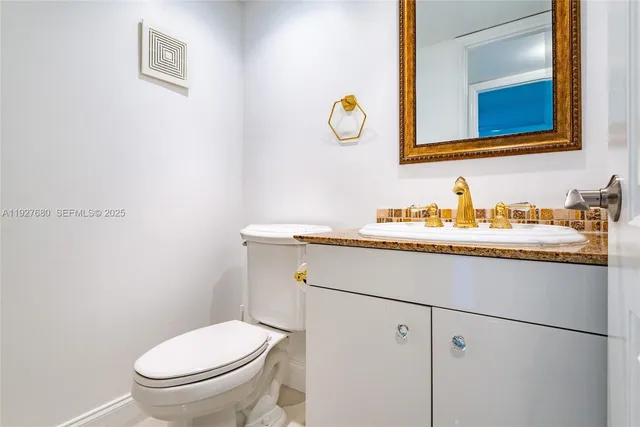 a bathroom with a sink and a toilet