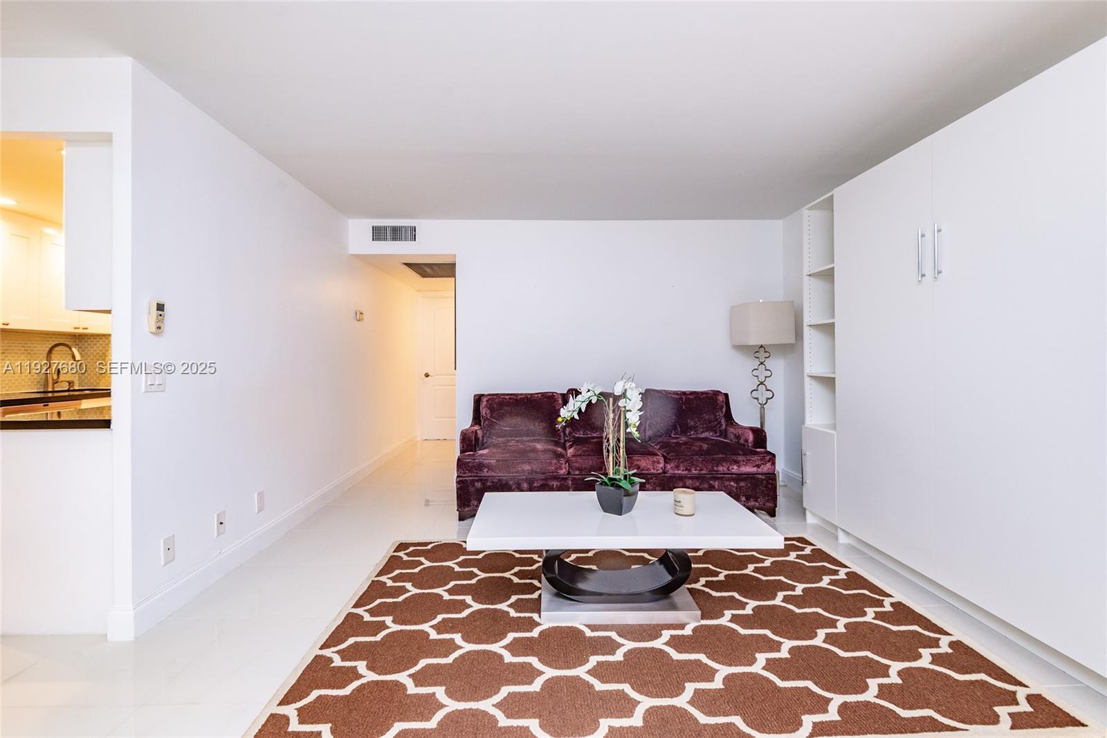 1061 Exeter, Unit 1061D Boca Raton, FL 33434 - Photo 8 of 32 a bathroom with a bathtub and shower