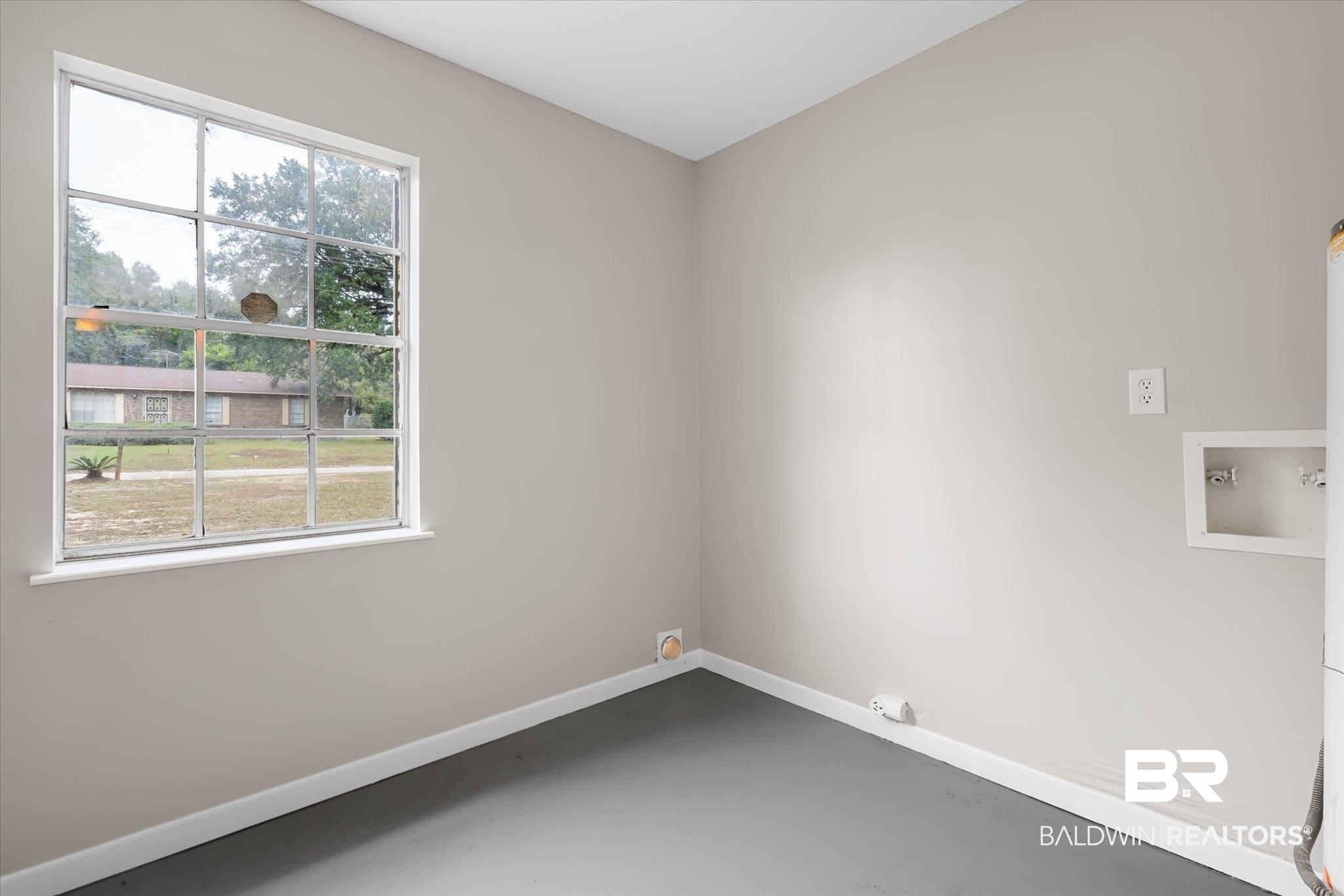 5015 Golfway Drive Eight Mile, AL 36613 - Photo 23 of 31 Empty room featuring a wealth of natural light