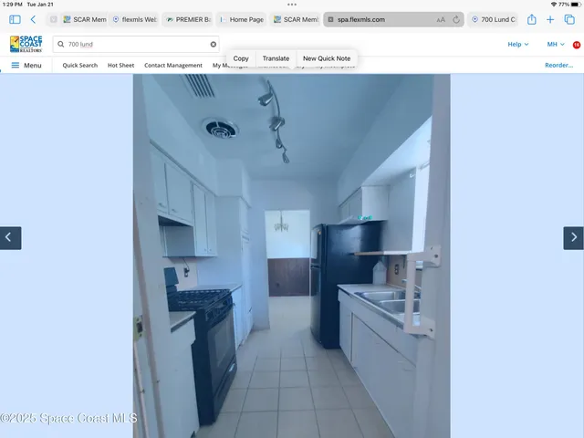 a view of a house with garden and porch