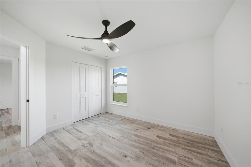 8846 Southwest Liverpool Road Arcadia, FL 34269 - Photo 19 of 49 wooden floor in an empty room
