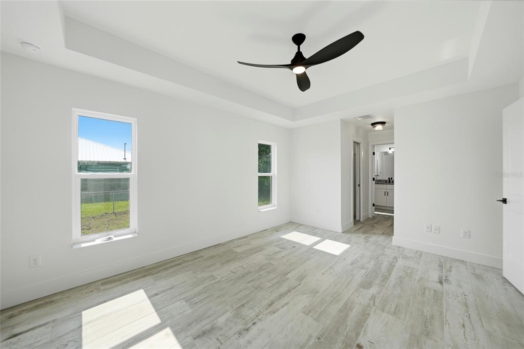 8846 Southwest Liverpool Road Arcadia, FL 34269 - Photo 26 of 49 wooden floor in an empty room with a window