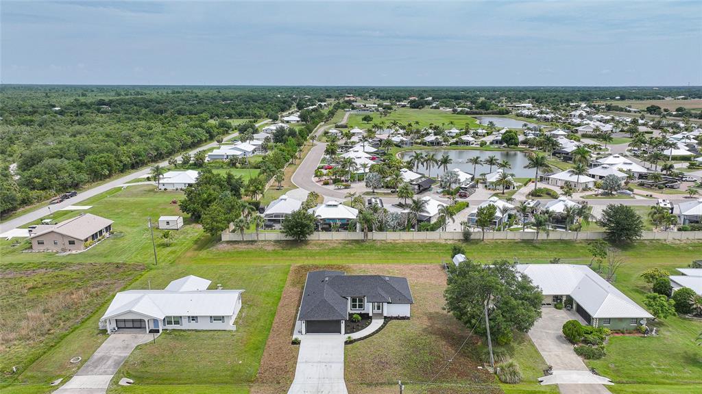 8846 Southwest Liverpool Road Arcadia, FL 34269 - Photo 40 of 49 an aerial view of a residential houses with outdoor space lake and ocean view
