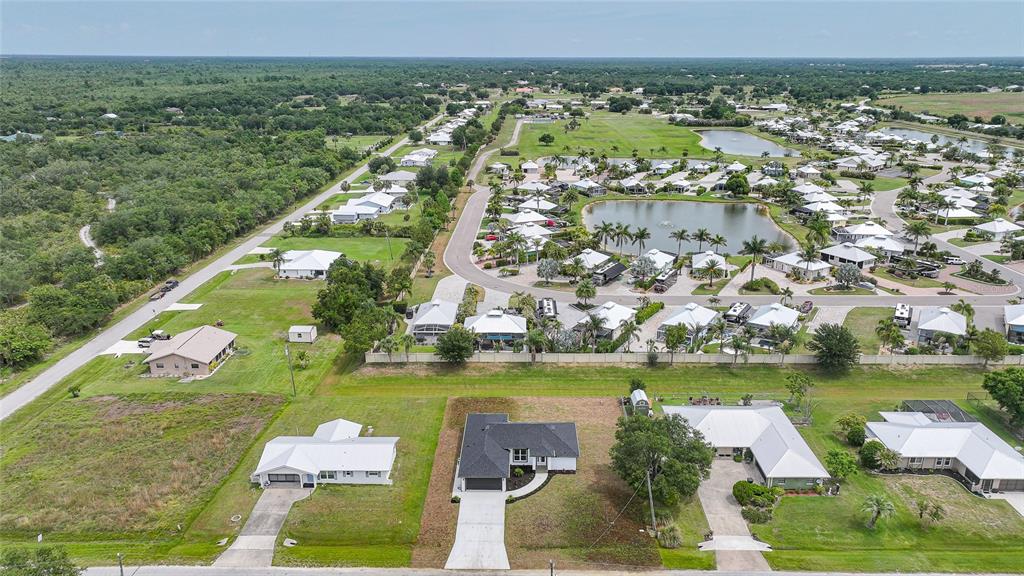 8846 Southwest Liverpool Road Arcadia, FL 34269 - Photo 45 of 49 a view of a city with lawn chairs