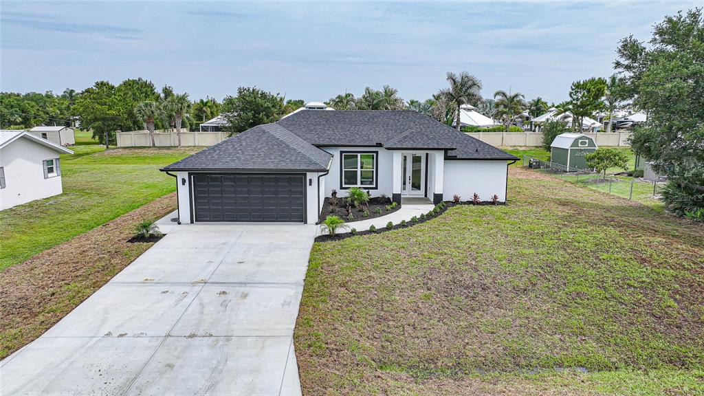 8846 Southwest Liverpool Road Arcadia, FL 34269 - Photo 46 of 49 a front view of a house with garden