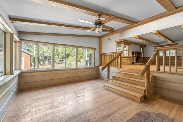 a kitchen with stainless steel appliances sink and wooden cabinets