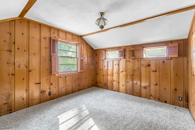 a view of a hallway with a window