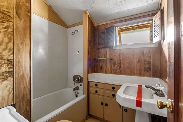 a house view with a backyard space