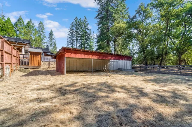 a view of a backyard of a house