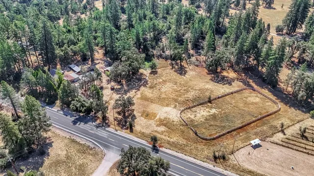 a view of a mountain view with mountains in the background