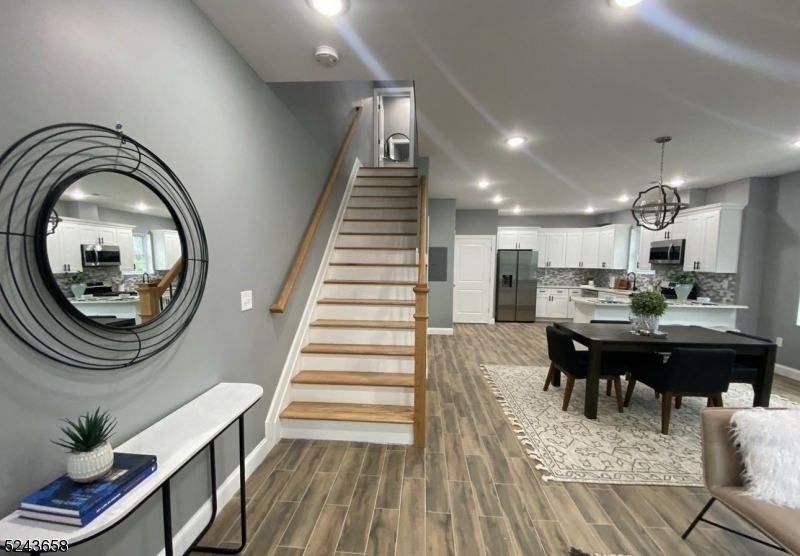825 Allwood Road, Unit A Clifton, NJ 07012 - Photo 5 of 11 a view of a dining room with furniture and wooden floor