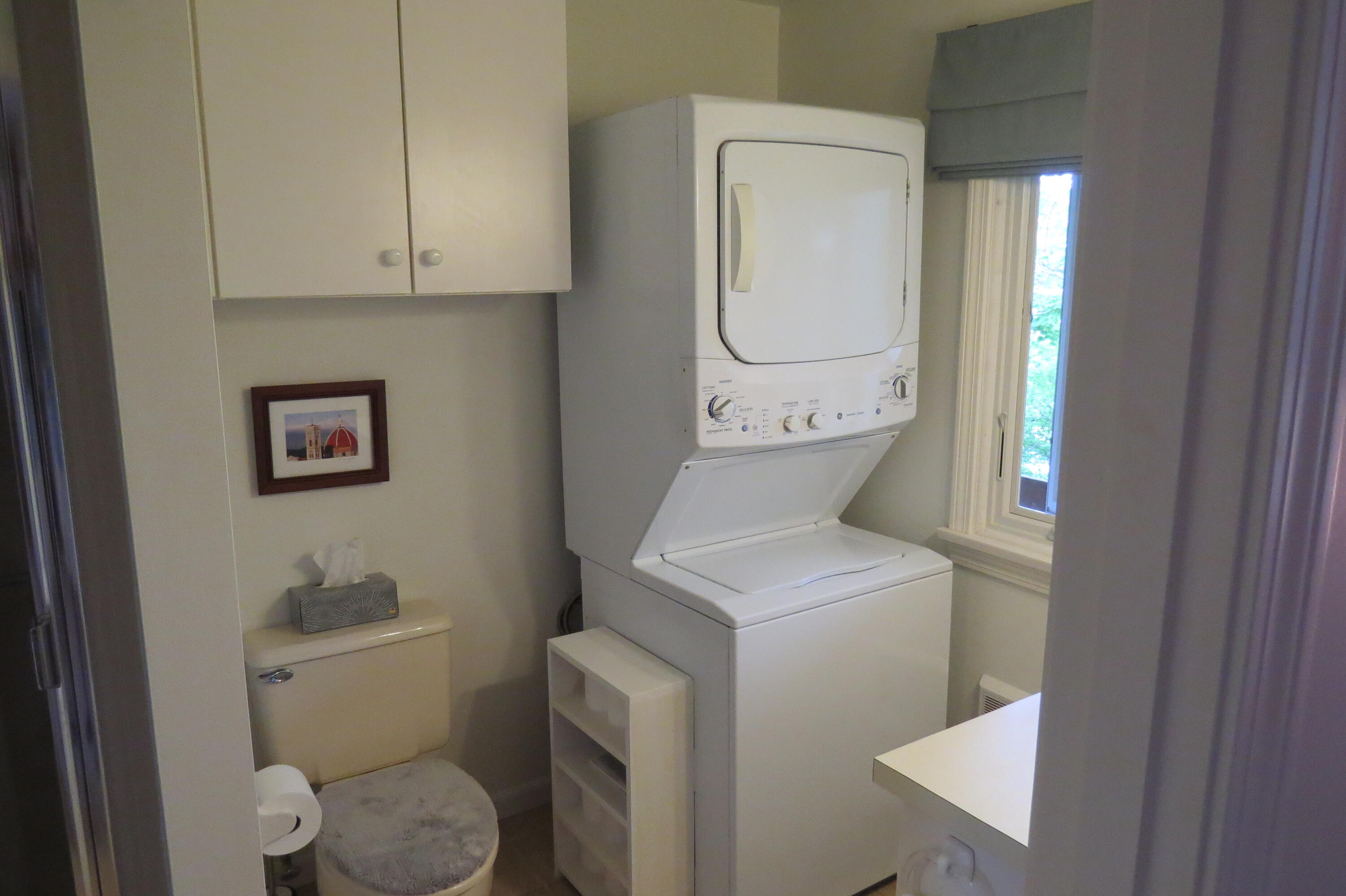 95 Depot Road, Unit 17 Chatham, MA 02633 - Photo 18 of 24 a bathroom with a toilet a sink and a mirror