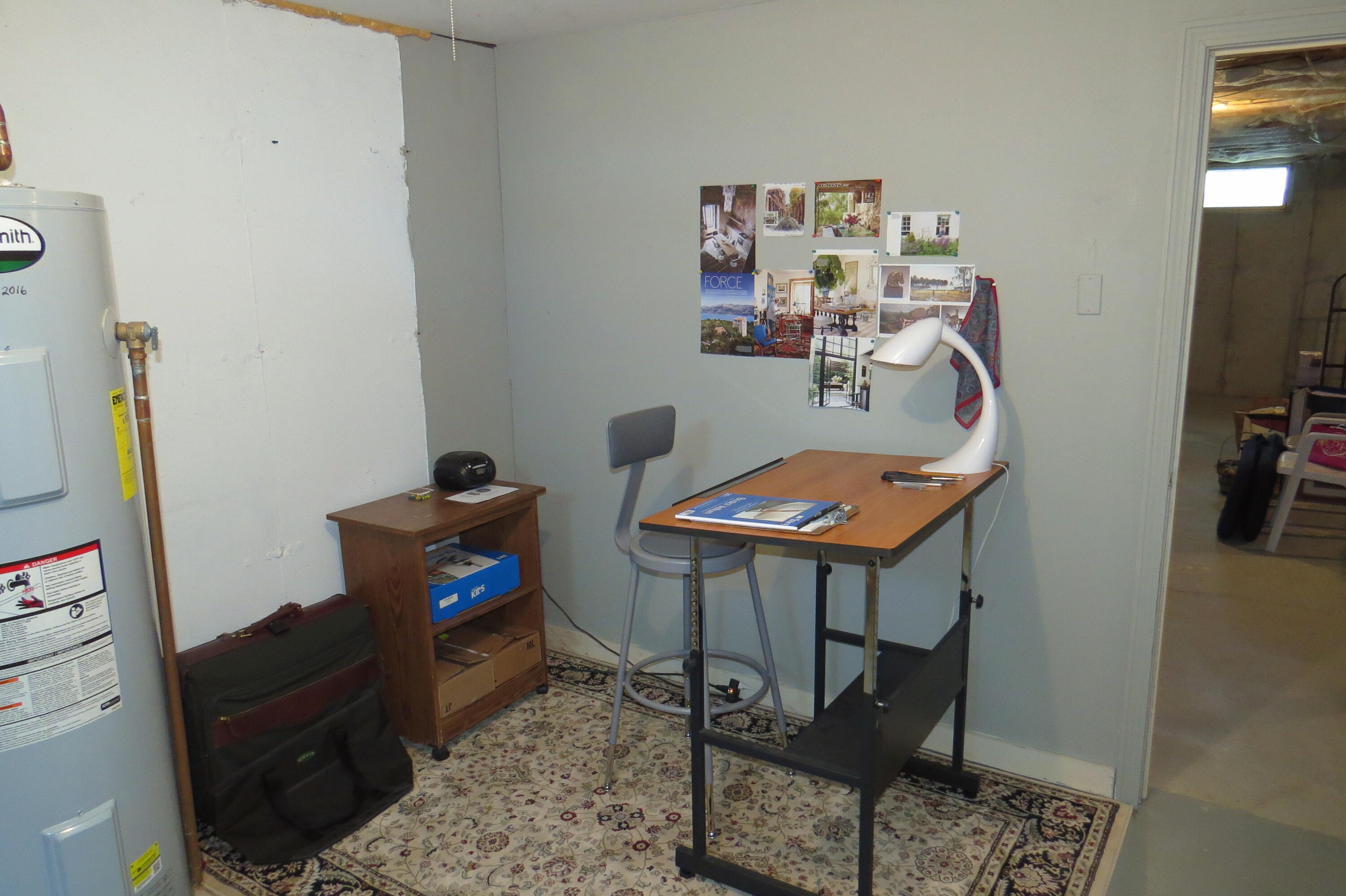 95 Depot Road, Unit 17 Chatham, MA 02633 - Photo 22 of 24 a living room with furniture and a flat screen tv