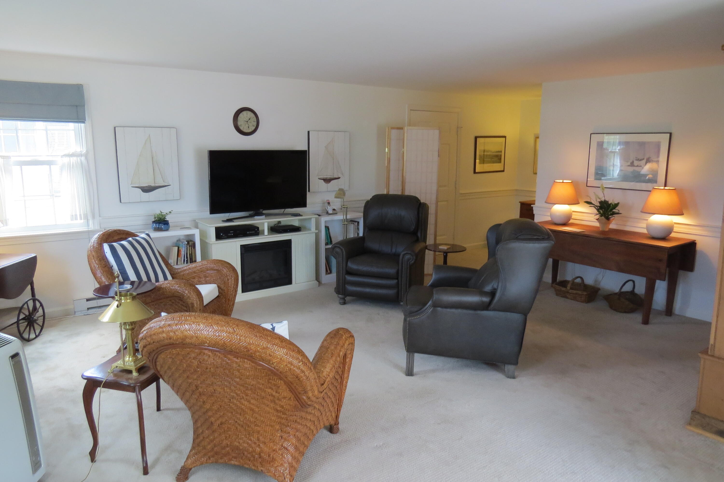 95 Depot Road, Unit 17 Chatham, MA 02633 - Photo 5 of 24 a living room with furniture and a flat screen tv