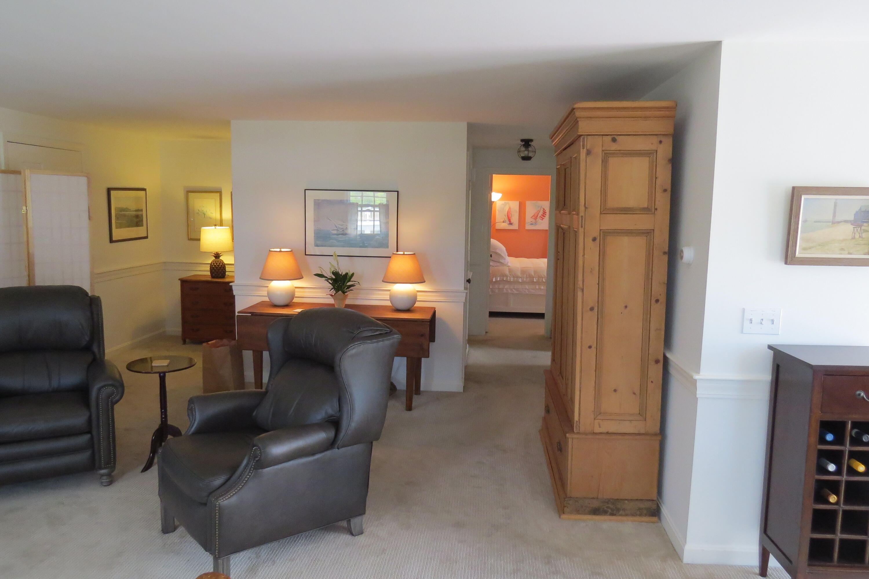 95 Depot Road, Unit 17 Chatham, MA 02633 - Photo 8 of 24 a living room with furniture and a window