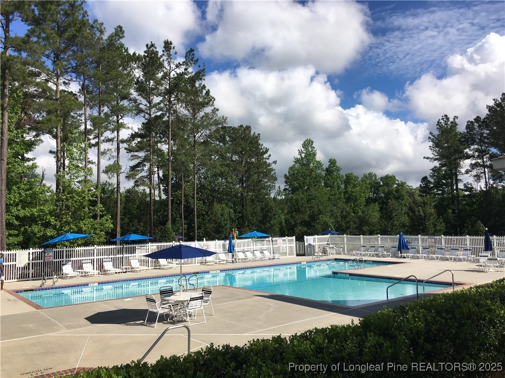 102 Graduate Court Durham, NC 27713 - Photo 8 of 20 a view of a swimming pool with a patio