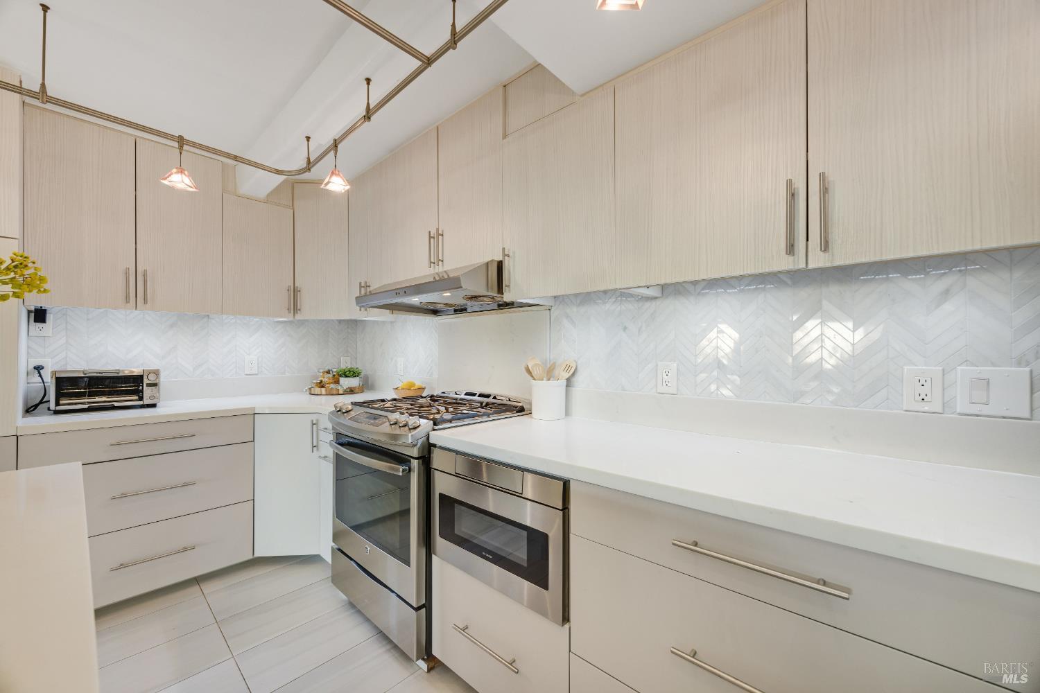 6960 Round Oak Road Penngrove, CA 94951 - Photo 26 of 58 a kitchen with stainless steel appliances granite countertop a sink and a stove