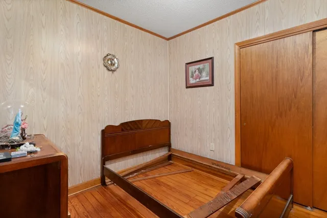 a room with furniture and wooden floor