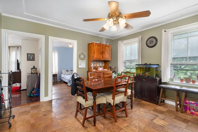 a view of a dining room with furniture window and outside view
