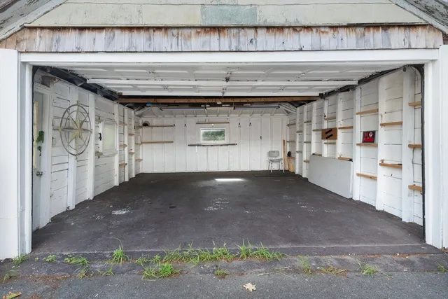 a picture of a bench in front of a wall