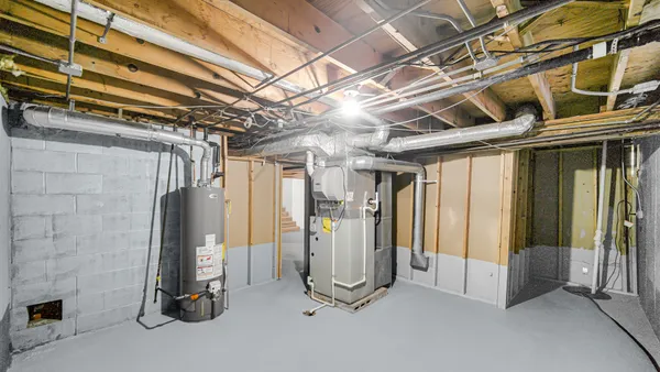 a view of a hallway with washer and dryer