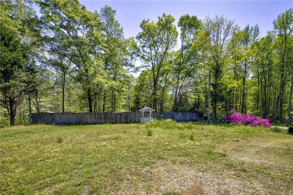 4201 Dunagan Road Gainesville, GA 30507 - Photo 11 of 37 a view of swimming pool with an outdoor space and seating area