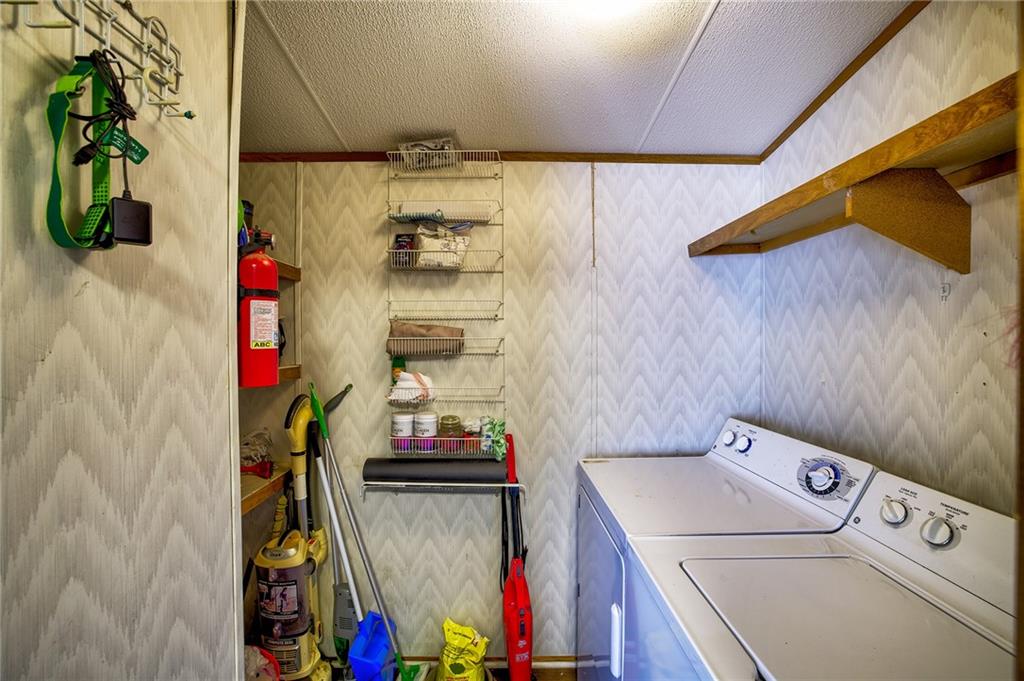 4201 Dunagan Road Gainesville, GA 30507 - Photo 19 of 37 a utility room with dryer and washer