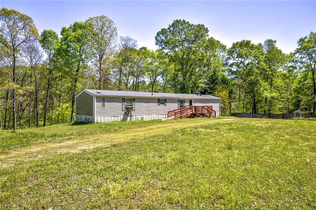 4201 Dunagan Road Gainesville, GA 30507 - Photo 3 of 37 a view of a yard with a house