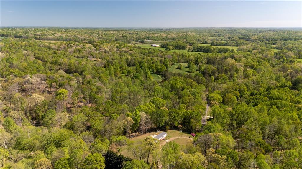 4201 Dunagan Road Gainesville, GA 30507 - Photo 37 of 37 an aerial view of residential houses with outdoor space and trees