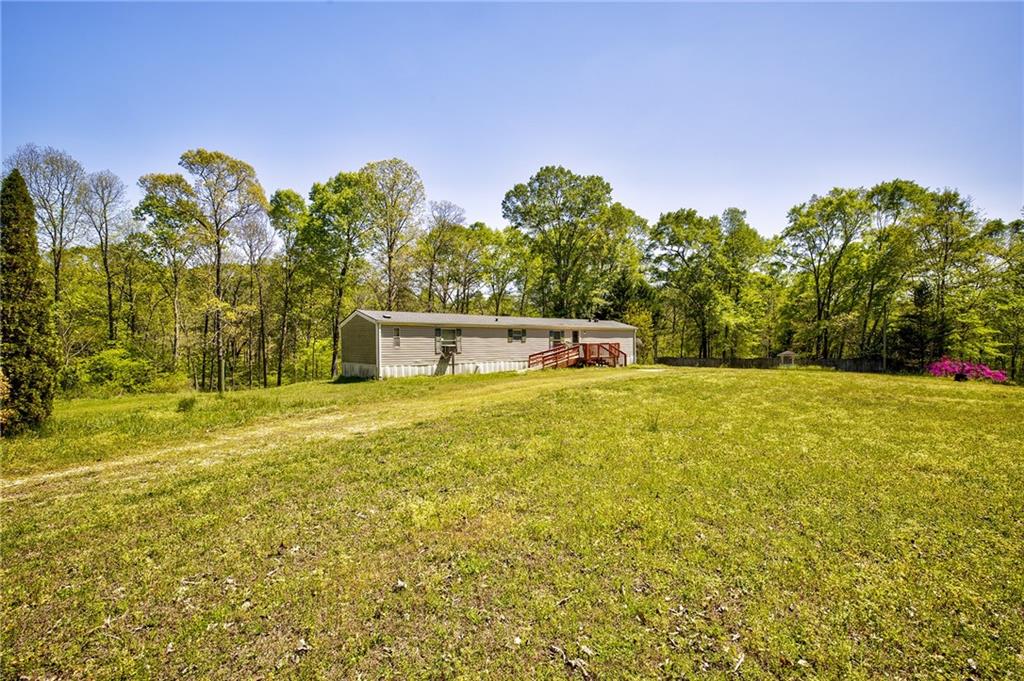 4201 Dunagan Road Gainesville, GA 30507 - Photo 4 of 37 a house view with swimming pool in front of it