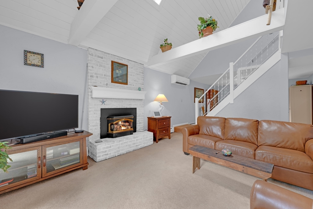 47 Horseshoe Circle Ware, MA 01082 - Photo 16 of 37 a living room with furniture and a fireplace