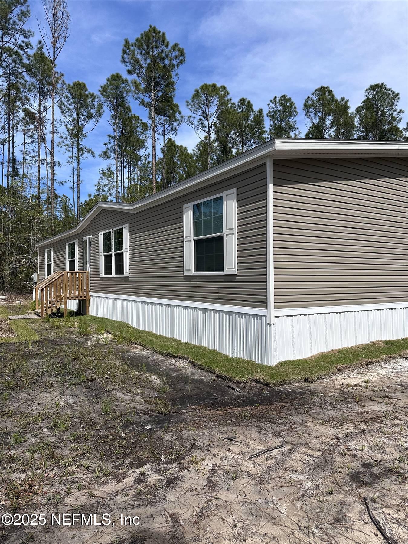 1391 Beech Boulevard Bunnell, FL 32110 - Photo 1 of 18 14088291-4