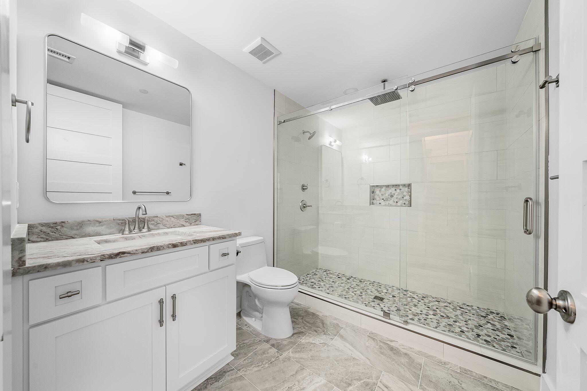 8711 Surf Drive Panama City, FL 32408 - Photo 21 of 81 1st Floor Bath