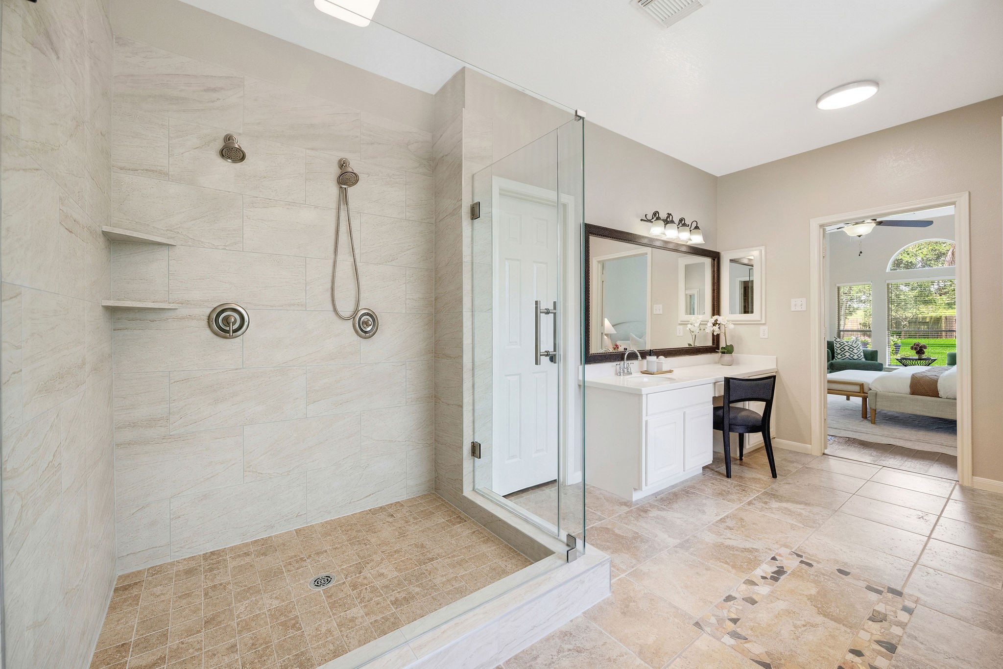 9603 Randon Lane Missouri City, TX 77459 - Photo 29 of 50 Newly remodeled shower with new seamless glass enclosure and hardware, 2 new shower heads and controls.