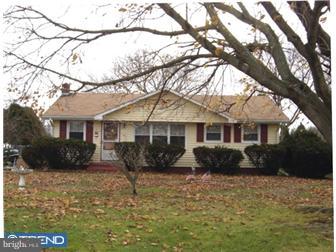 18 Stanger Road Bridgeton, NJ 08302 - Photo 1 of 1 a front view of a house with a yard covered in snow