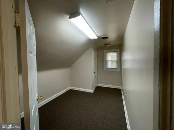 en empty room with windows