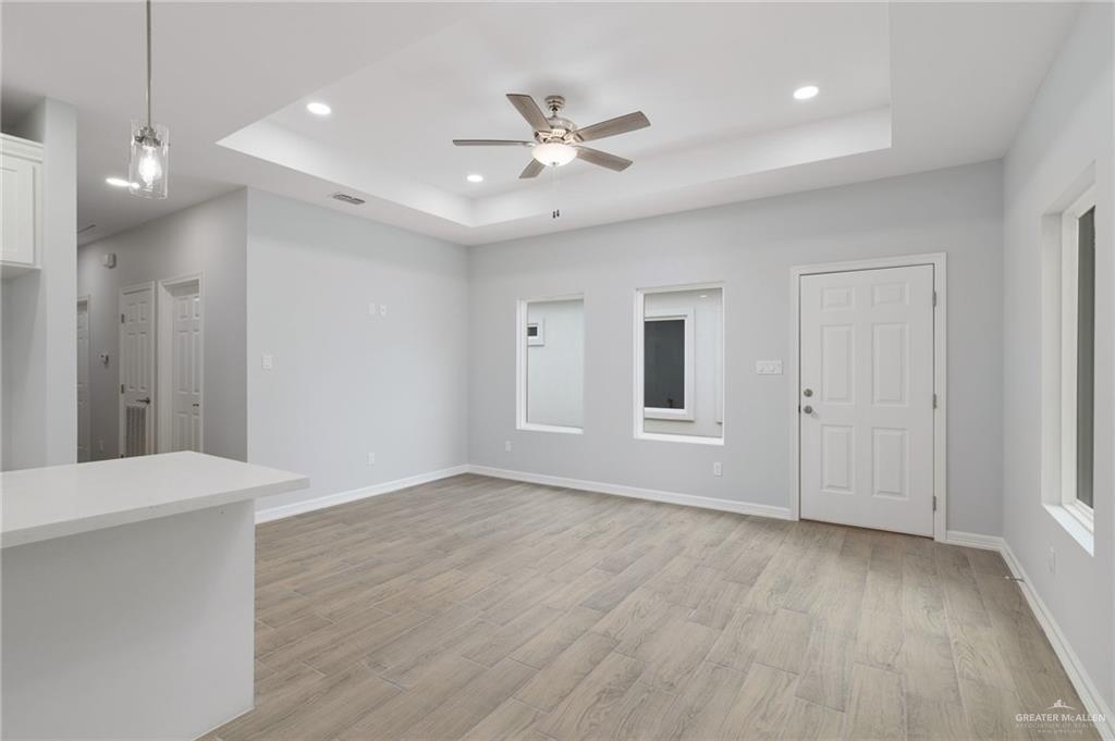 412 East Acacia Avenue, Unit 1 Alamo, TX 78516 - Photo 12 of 22 a view of an empty room with a window