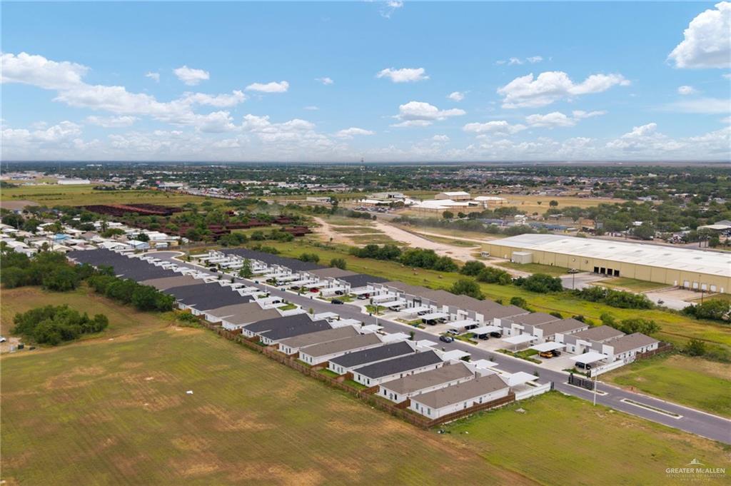 412 East Acacia Avenue, Unit 1 Alamo, TX 78516 - Photo 21 of 22 an aerial view of residential building and ocean