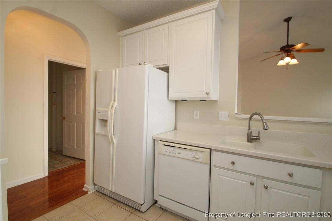 8508 Neuse Garden Drive Raleigh, NC 27616 - Photo 15 of 44 a kitchen with cabinets stainless steel appliances and a sink