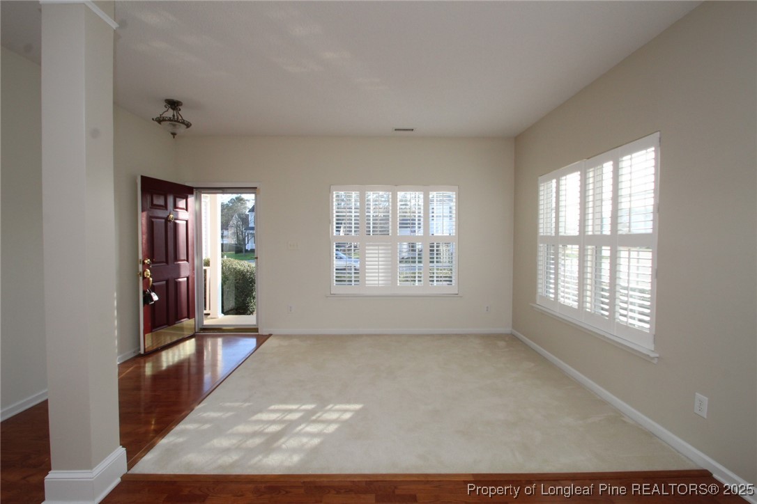 8508 Neuse Garden Drive Raleigh, NC 27616 - Photo 2 of 44 a view of an empty room with a window
