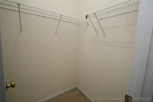 a view of a room with racks on the wall