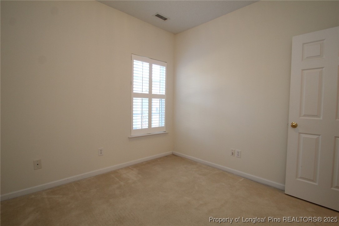 8508 Neuse Garden Drive Raleigh, NC 27616 - Photo 38 of 44 an empty room with a window