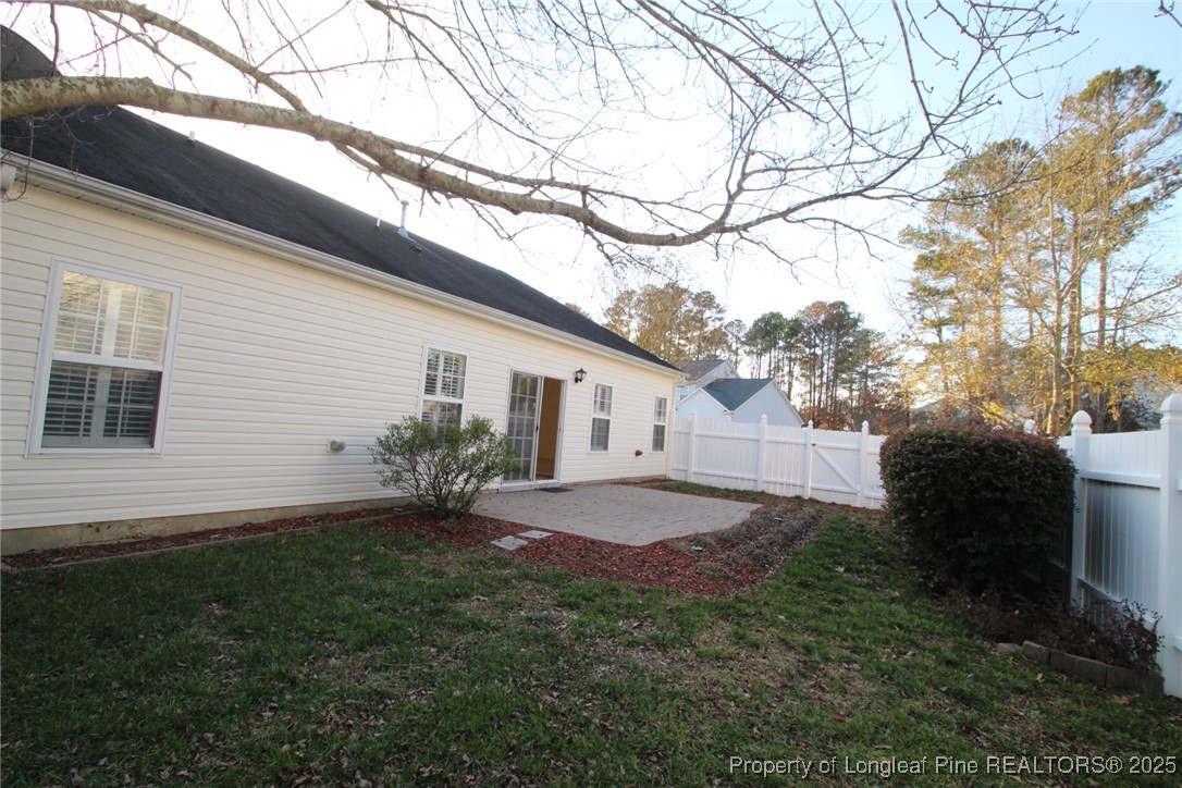 8508 Neuse Garden Drive Raleigh, NC 27616 - Photo 44 of 44 a backyard of a house with table and chairs